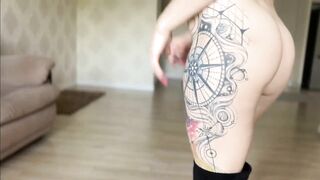 Blonde Solo Babe in High Boots Shows Off Her Tattoos and Big Assets