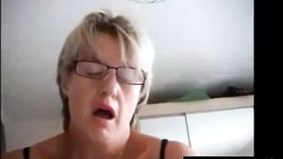 Busty Amateur MILF Gives a Handjob on Webcam