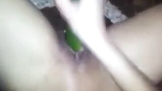 Asian Girl's Solo Fun with a Cucumber