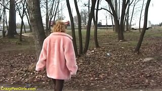 Redhead wife pissing in outdoor