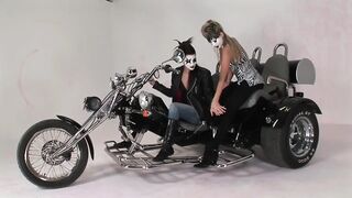 Lesbian Moto Riders with Painted Faces Licking Pussy and Playing with a Dildo