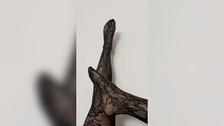Rubbing my legs and feet in sexy black stocking