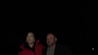 Horny brunette in sexy stockings swallows a warm load outdoors