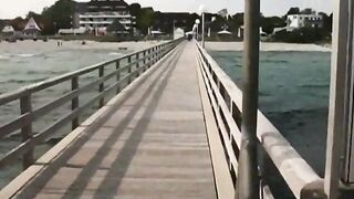 Big-Titted German Amateur Gives a Blowjob on a Pier
