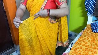 Beautiful Indian bhabhi having wearing a saree.