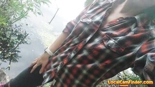 Brunette teen masturbates by the lake