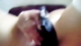 Brunette European Girl Plays with Black Dildo