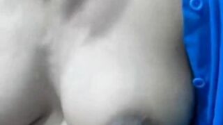 Squeezing Milk Out of Her Dark Nipples on Webcam