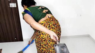 The maid was sweeping in front of her mistress.