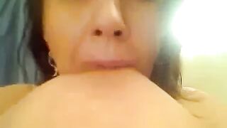 Big-Titted Webcam Girl Self-Sucks Hands-Free