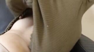 Long Nipples Peeking Through a Green Jumper