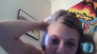 Blonde Teen Pleasures Herself with a Vibrator on Webcam