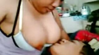 Busty Asian Babe Gives Sensual Blowjob and Titillates with Massive Boobs